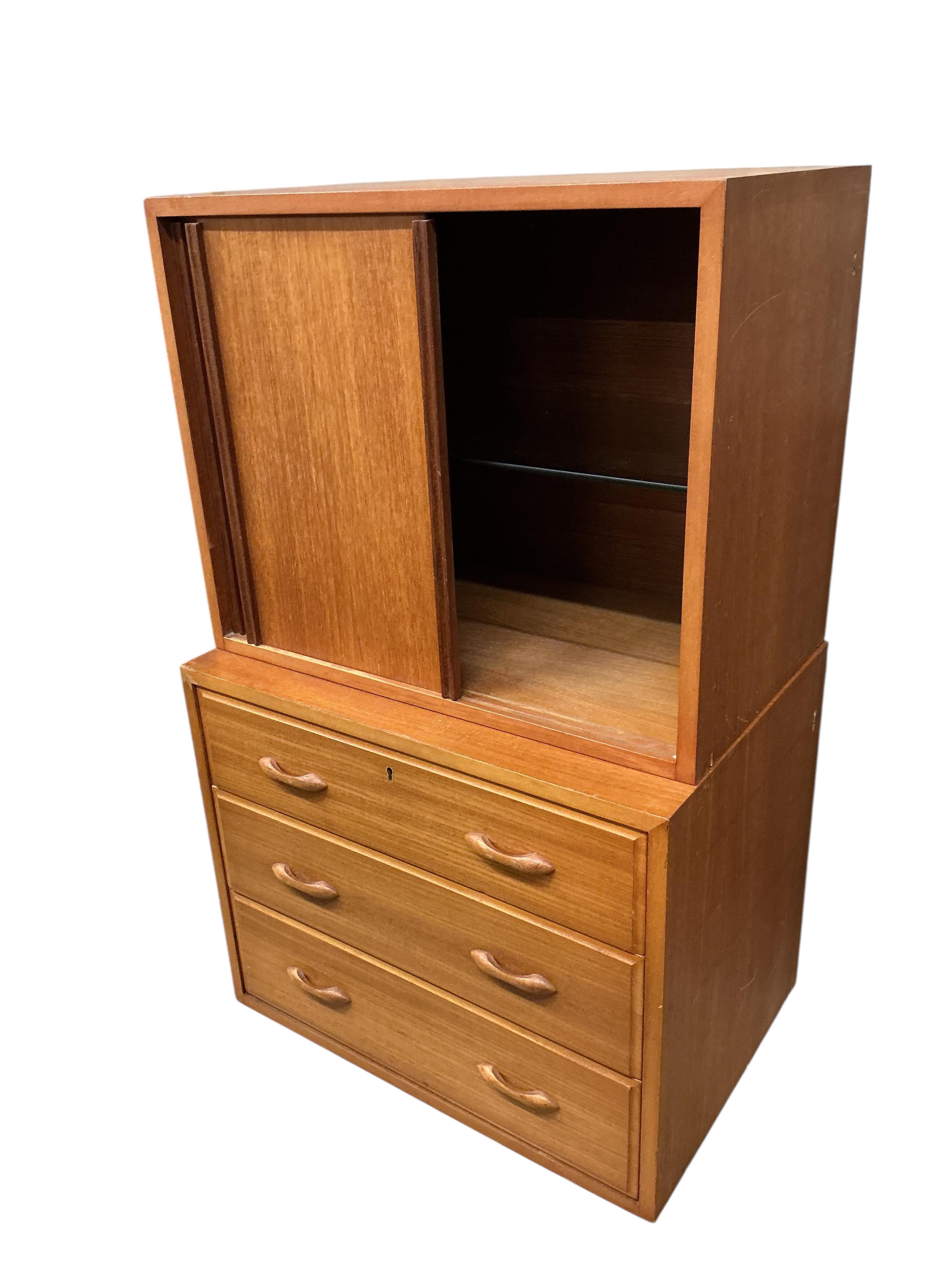 A Ladderax unit with wooden doors, larger width 59cm, depth 40cm, height 47cm together with a drawer unit